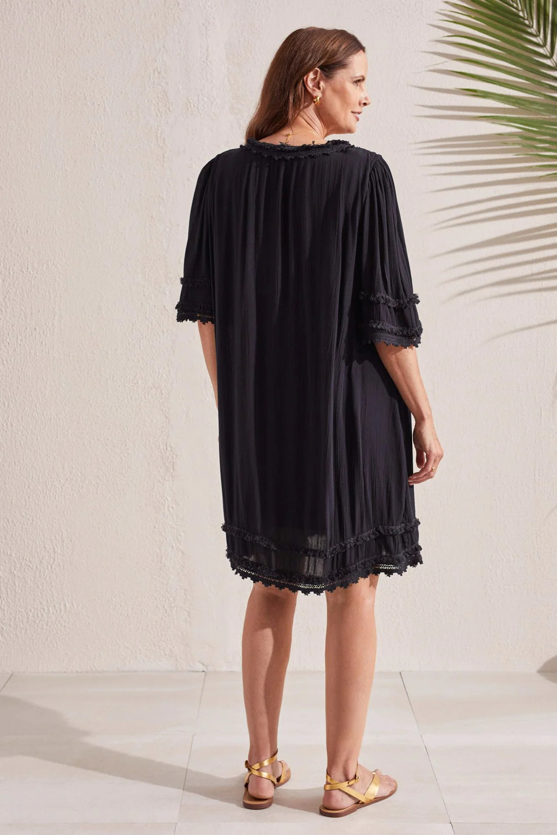 Step into beachy bohemian style with this flowy shift dress. We love the notch neck design, short sleeves, loose fit, woven crepe fabric, and decorative crochet trim that outlines the look.