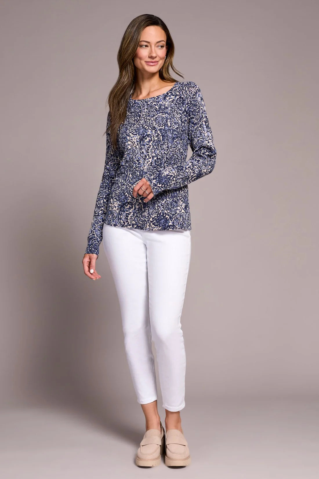 Wrap yourself in effortless warmth and style with this striking sweater, featuring a bold, eye-catching print. Crafted from luxuriously soft cable-knit combed cotton, it delivers the perfect blend of coziness and breathability. Long sleeves offer elegant coverage, while the classic crew neckline completes the look with refined sophistication.