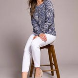 Wrap yourself in effortless warmth and style with this striking sweater, featuring a bold, eye-catching print. Crafted from luxuriously soft cable-knit combed cotton, it delivers the perfect blend of coziness and breathability. Long sleeves offer elegant coverage, while the classic crew neckline completes the look with refined sophistication.