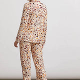 Get your beauty sleep while looking fabulous courtesy of this printed pajama set made from soft jersey fabric.