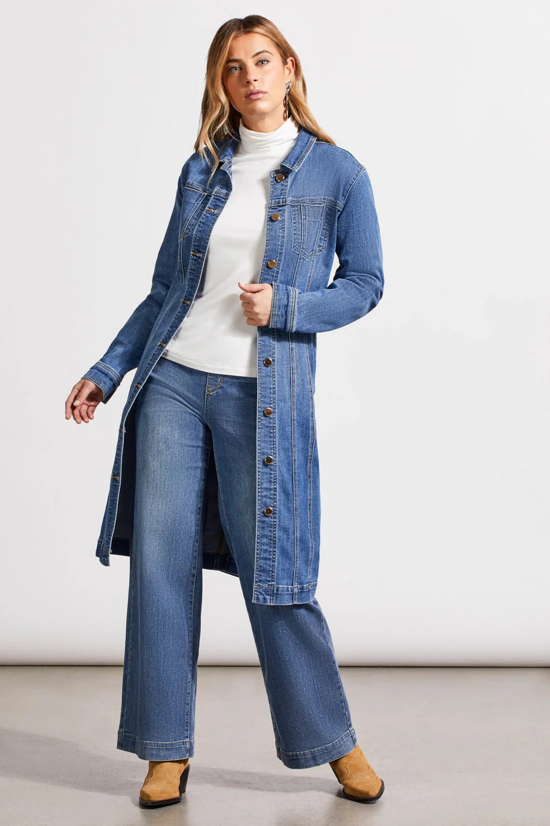 Achieve the perfect one-and-done ensemble effortlessly with our denim dress jacket. With its long-sleeve design and a flattering 45" length providing just the right coverage, this jacket exudes understated elegance.