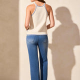 Make a statement in this halter sweater tank, exuding bohemian charm with its vibrant retro crochet design. Delight in the close fit that accentuates your curves, while the contrast ribbed finishing at the hem adds a touch of flair. Crafted from soft yet breathable combed cotton fabric, this tank ensures both comfort and style for any occasion.