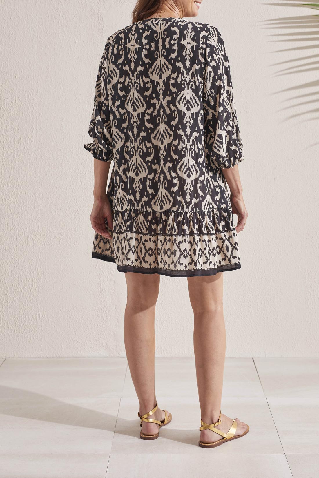 Get ready to turn heads in this Tribal 3/4 Sleeve Dress with Bottom Frill. The unique french oak pattern adds a touch of playful elegance, while the frilled bottom adds a fun twist. Perfect for any occasion, this dress effortlessly combines style and comfort.