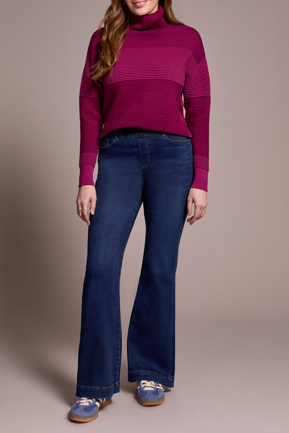 The Tribal Audrey Pull On Flare Jean combines style and comfort with a soft, comfortable waistband that ensures a perfect fit without the need for a zipper or buttons. Featuring five classic pockets and sturdy belt loops, these jeans offer both practicality and a flattering silhouette.