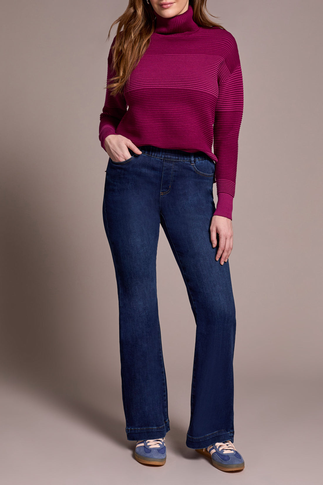 The Tribal Audrey Pull On Flare Jean combines style and comfort with a soft, comfortable waistband that ensures a perfect fit without the need for a zipper or buttons. Featuring five classic pockets and sturdy belt loops, these jeans offer both practicality and a flattering silhouette.