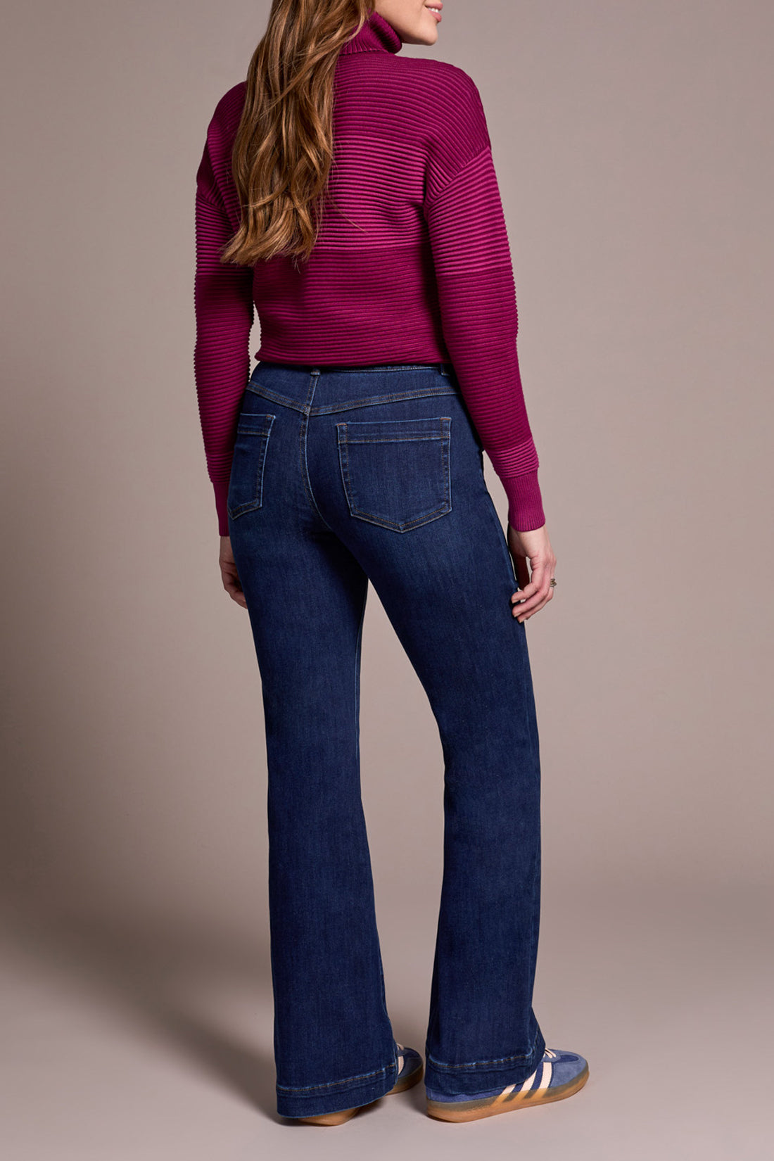 The Tribal Audrey Pull On Flare Jean combines style and comfort with a soft, comfortable waistband that ensures a perfect fit without the need for a zipper or buttons. Featuring five classic pockets and sturdy belt loops, these jeans offer both practicality and a flattering silhouette.