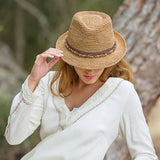 A marriage of tropical materials with urban style, the Tahiti short brim sun hat can be worn anywhere your travels take you.