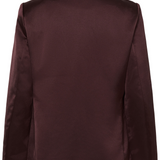 Back of a deep wine coloured sateen blazer photographed against a light background.