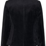 Back of a black velour blazer photographed on a light background.