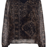 A printed brown v neck blouse photographed against a light background.