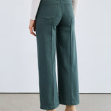 The FDJ Olivia Wide Leg in spruce offers a comfortable and stylish fit with its wide-leg design. Crafted for ease of movement and a flattering silhouette, this piece is perfect for adding a touch of relaxed elegance to your wardrobe. Its versatile spruce colour complements a variety of outfits, making it an essential addition for everyday wear.