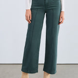 The FDJ Olivia Wide Leg in spruce offers a comfortable and stylish fit with its wide-leg design. Crafted for ease of movement and a flattering silhouette, this piece is perfect for adding a touch of relaxed elegance to your wardrobe. Its versatile spruce colour complements a variety of outfits, making it an essential addition for everyday wear.