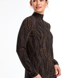 This FDJ Long Sleeve Mock Neck Top features a subtle trellis print in neutral colours. The sophisticated design adds a touch of elegance to your wardrobe, making it a versatile and stylish addition. The perfect balance between bold and understated, this top is sure to become a staple in your closet.