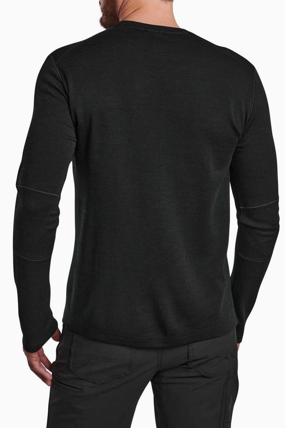 Black long-sleeve shirt worn by a person on a white background