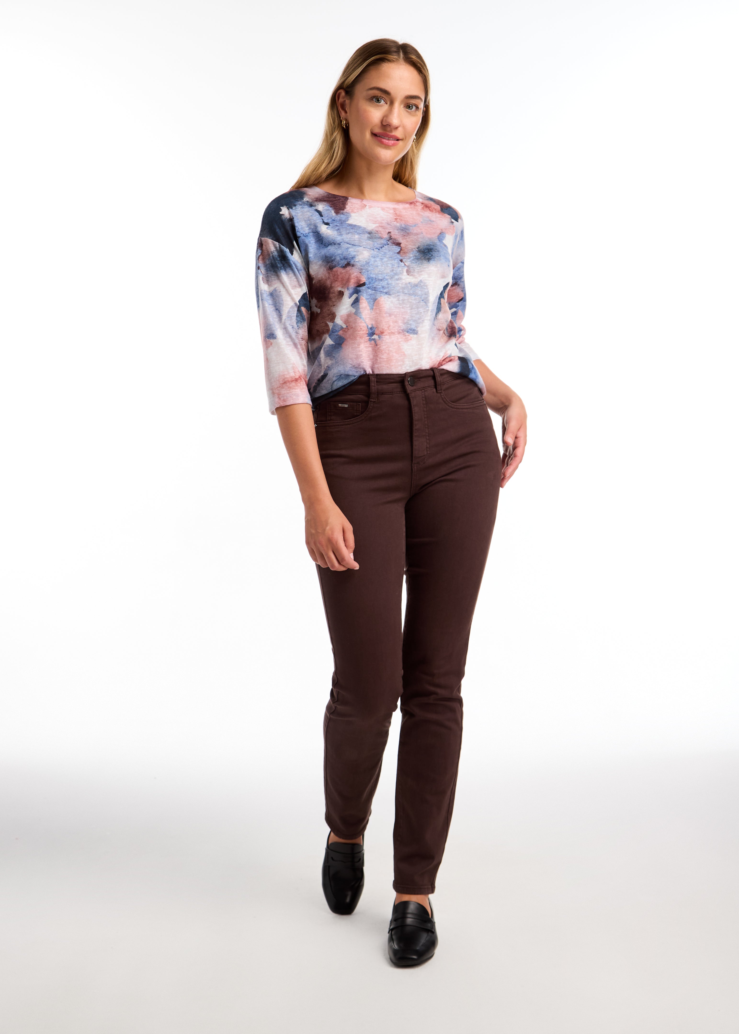 Elevate your wardrobe with the FDJ Drop Shoulder Boat Neck Top. This stylish top features 3/4 sleeves, and a denim-friendly playful print. Stay comfortable and chic in this must-have piece.