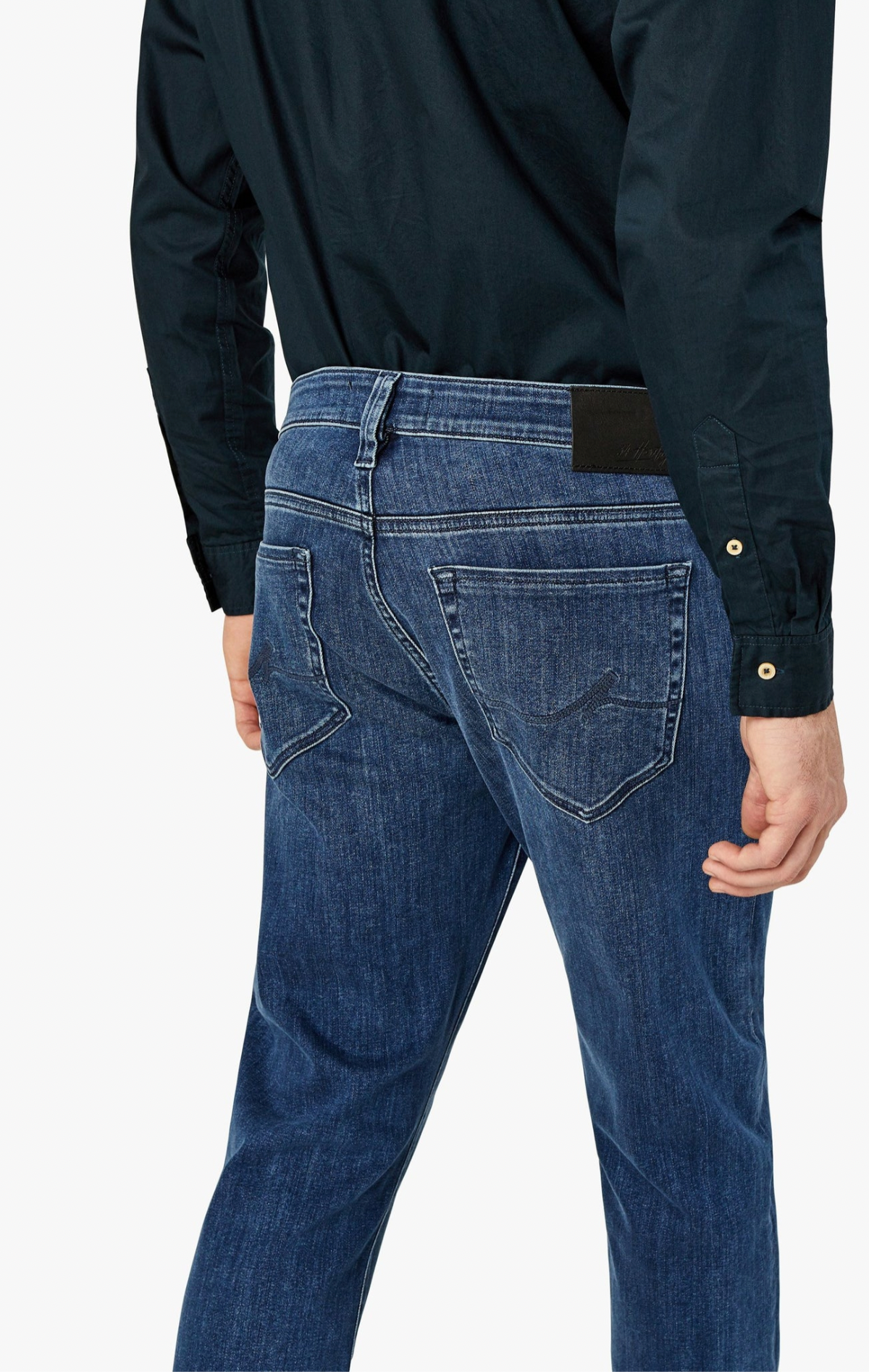 A contemporary fabrication complements the classic styling of this higher-rise, straight leg jean. They are cut from premium stretch denim that has a distinguished, modern appearance in a versatile wash to easily transition from casual to semiformal. Designed with comfort and effortless wear in mind, these have a relaxed fit through the leg that’s tailored to eliminate excess fabric at the hip and thigh.