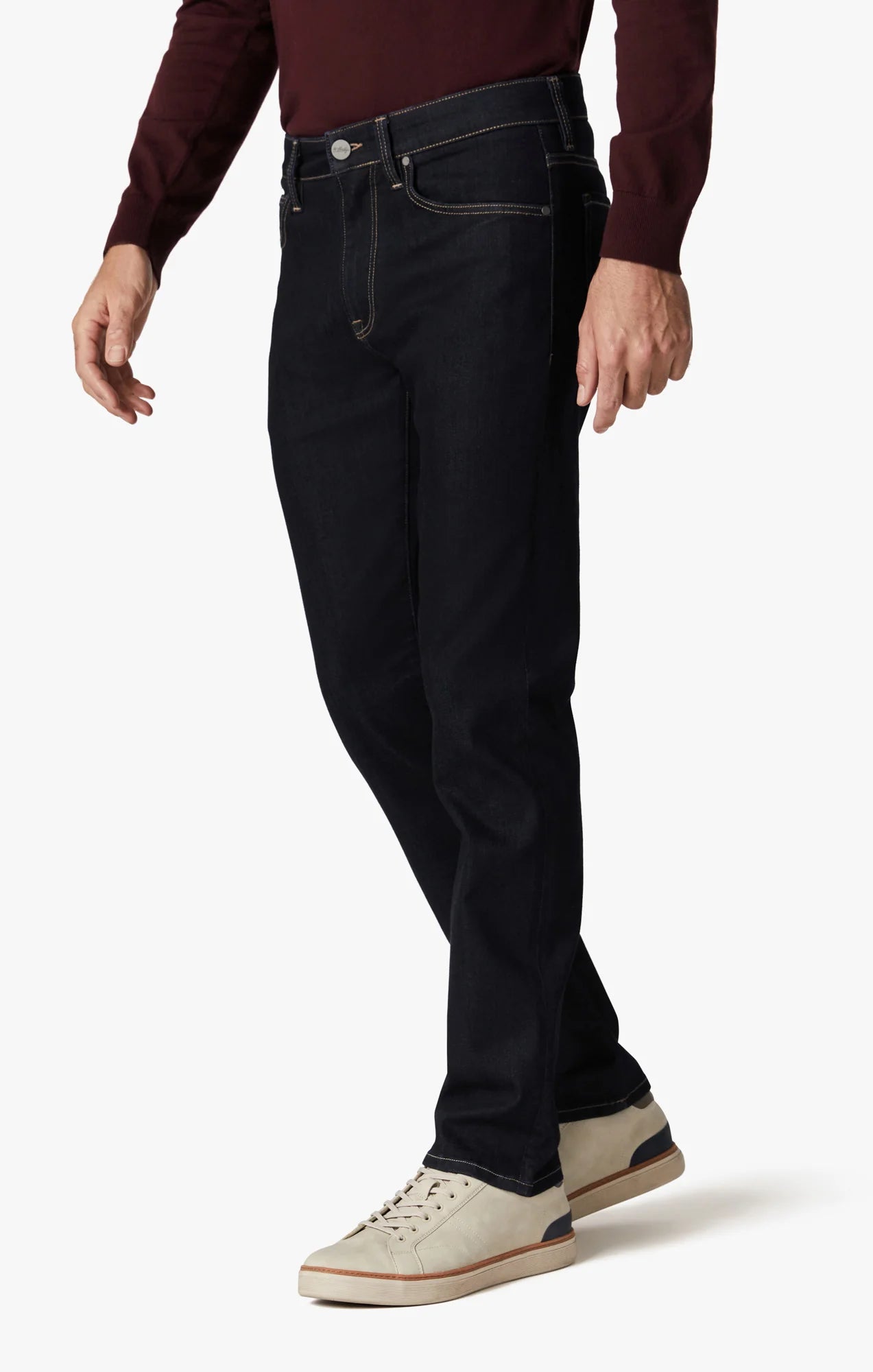 These contemporary pants are designed in a tailored, straight leg silhouette. Detailed with tonal hardware and contrast stitching, this mid-weight staple elevates any ensemble with its superior comfort, soft hand feel, and exceptional stretch.
