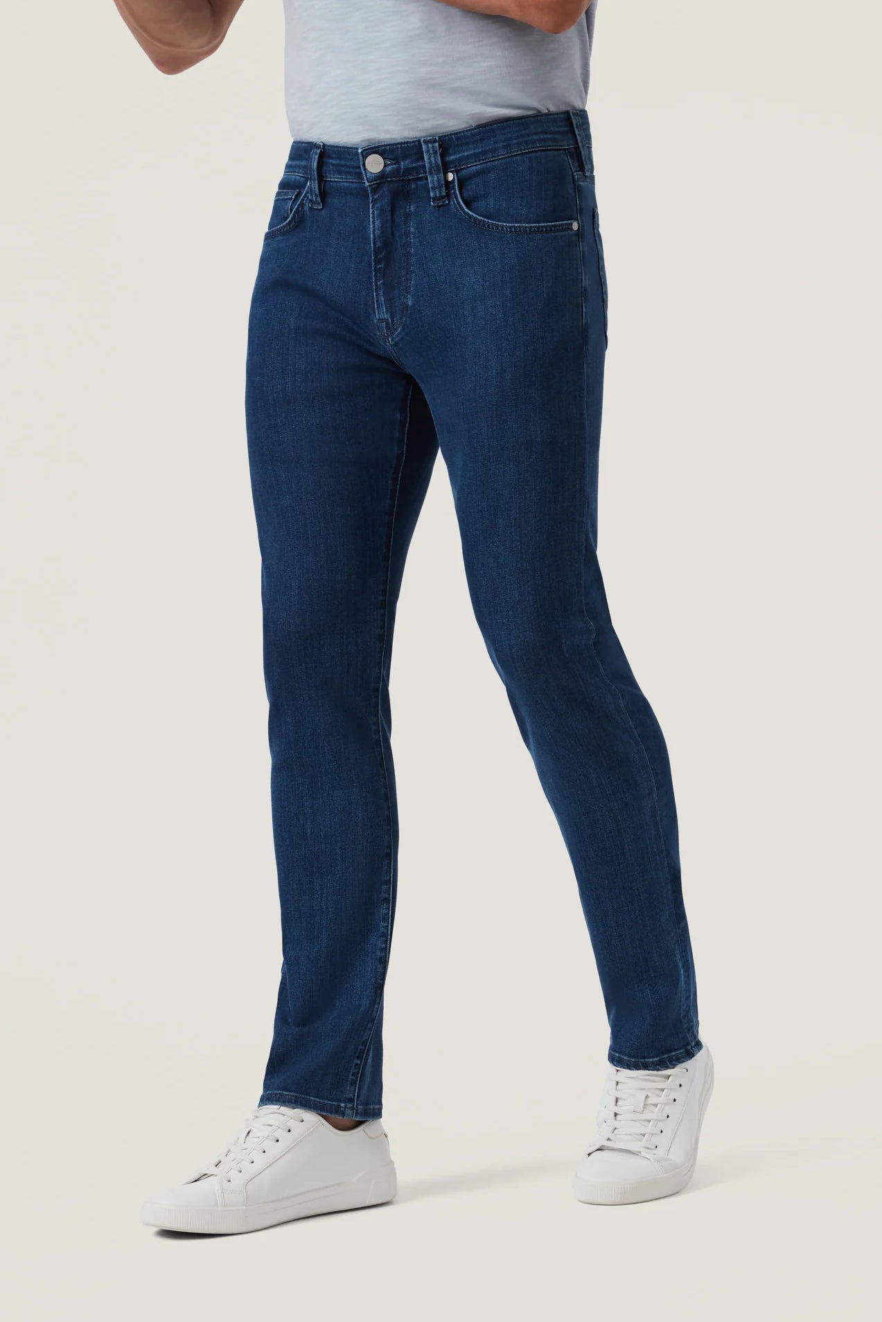 Crafted with a modern mid-rise and an ultra-comfortable straight-leg fit, these jeans offer the perfect balance of contemporary style and timeless appeal. Made from premium, sustainable recycled materials, they’re finished in a sleek night blue wash for an effortlessly refined look ideal for everyday wear.