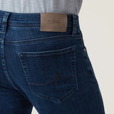 Crafted with a modern mid-rise and an ultra-comfortable straight-leg fit, these jeans offer the perfect balance of contemporary style and timeless appeal. Made from premium, sustainable recycled materials, they’re finished in a sleek night blue wash for an effortlessly refined look ideal for everyday wear.