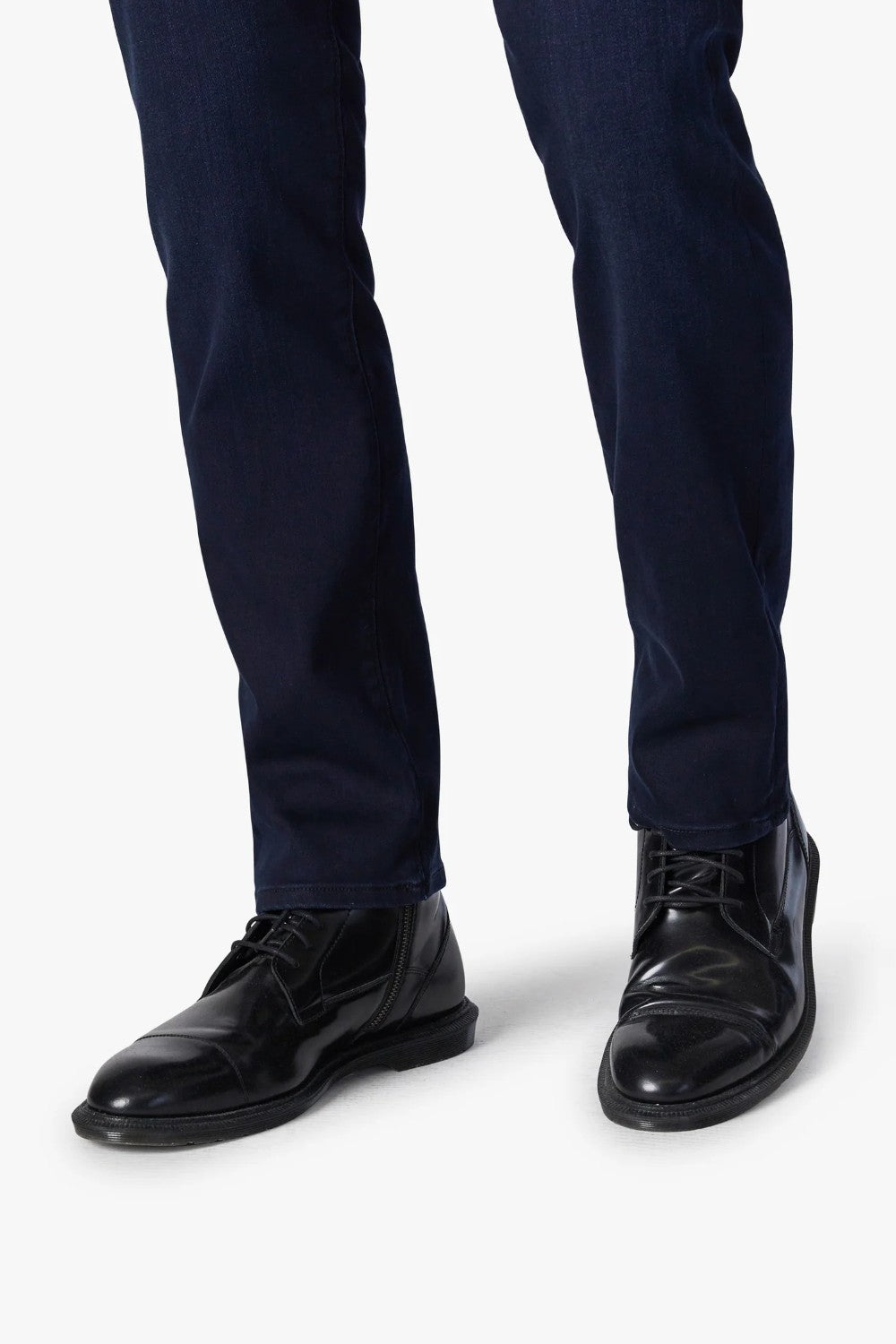 The Ink Rome features a rich dark indigo wash in a denim fabric that can easily get dressed up for any occasion. Features updated flat rivets and a rolled waistband for an ultra modern look. Luxurious stretch fabrication make these ultra comfortable.