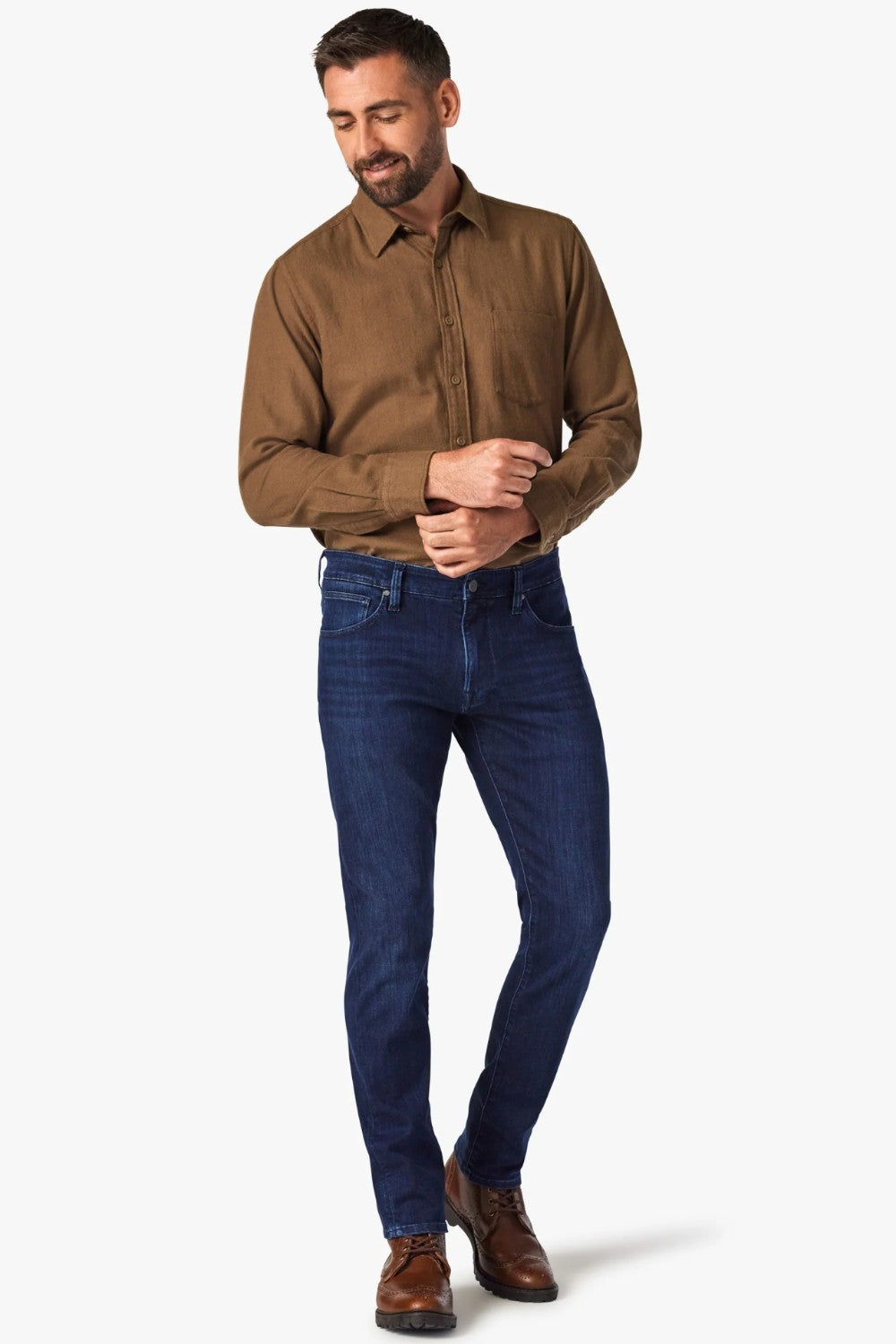 Dress up the everyday with this dark-wash jean designed with a streamlined slim leg and denim that has a luxe look and feel. The fabrication has a higher proportion of elastane for maximum stretch, all while maintaining the appearance of an authentic, elegant jean.