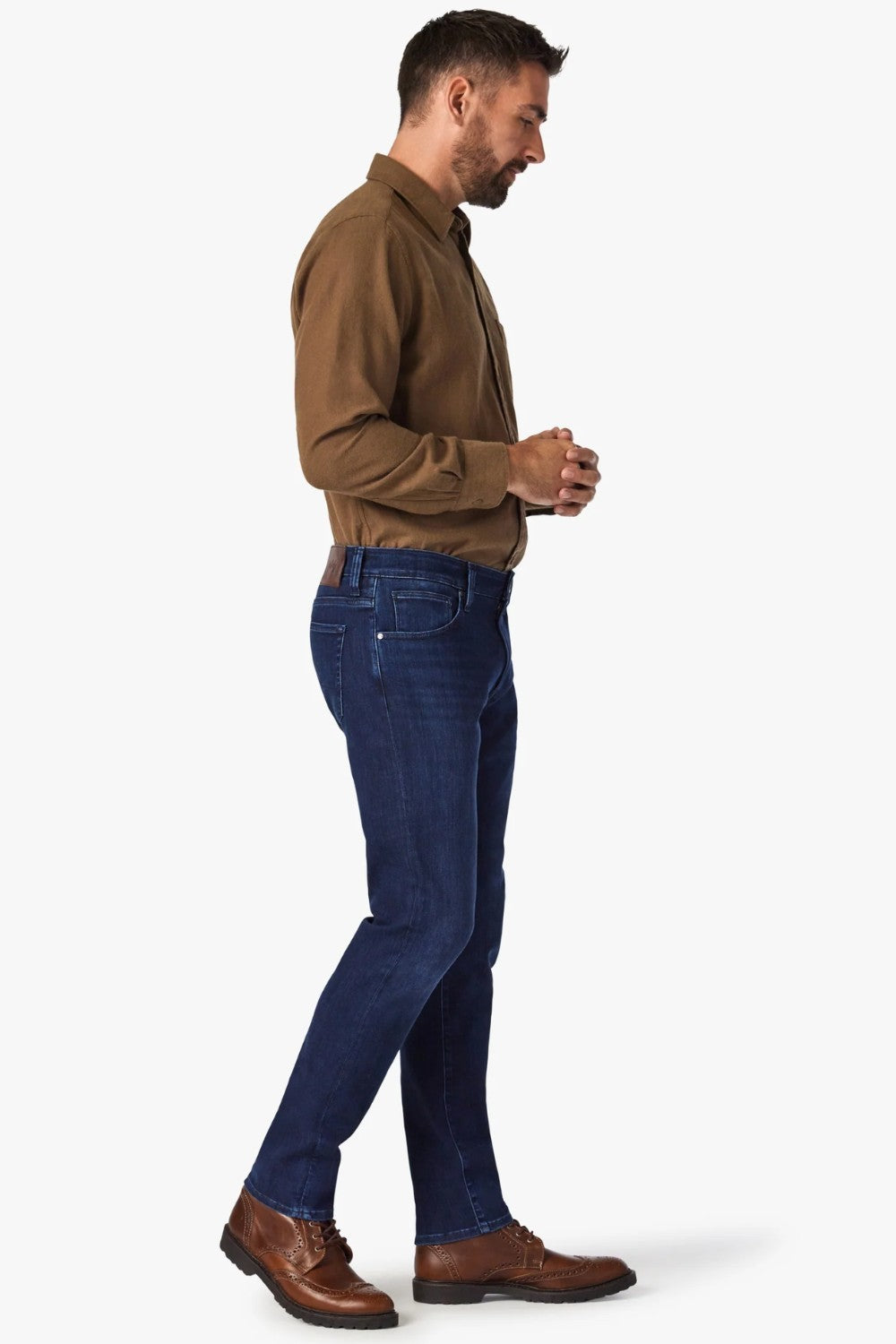 Dress up the everyday with this dark-wash jean designed with a streamlined slim leg and denim that has a luxe look and feel. The fabrication has a higher proportion of elastane for maximum stretch, all while maintaining the appearance of an authentic, elegant jean.
