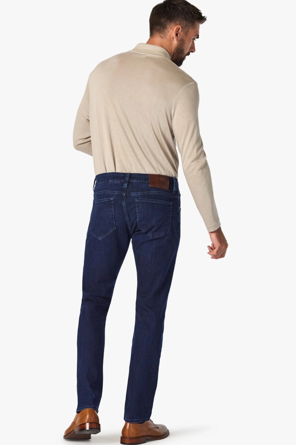 Elevate any occasion in this pair of sleek, dark-wash jeans cut from denim with a luxe look and feel. Made for movement with a higher proportion of elastance, this pair still maintains the texture of an authentic jean. A modern straight leg feels just roomy enough while flattering from every angle.