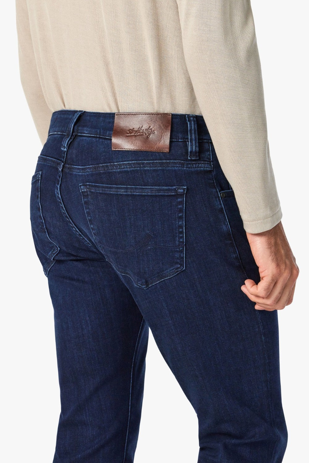 Elevate any occasion in this pair of sleek, dark-wash jeans cut from denim with a luxe look and feel. Made for movement with a higher proportion of elastance, this pair still maintains the texture of an authentic jean. A modern straight leg feels just roomy enough while flattering from every angle.