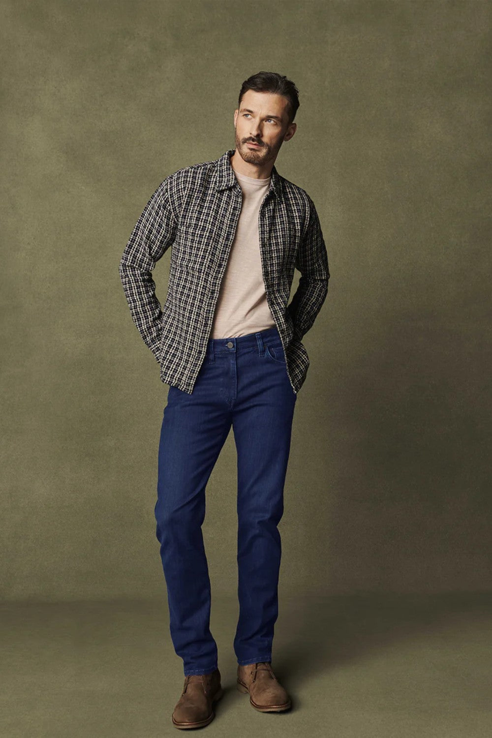 Elevate any occasion in this pair of sleek, dark-wash jeans cut from denim with a luxe look and feel. Made for movement with a higher proportion of elastance, this pair still maintains the texture of an authentic jean. A modern straight leg feels just roomy enough while flattering from every angle.