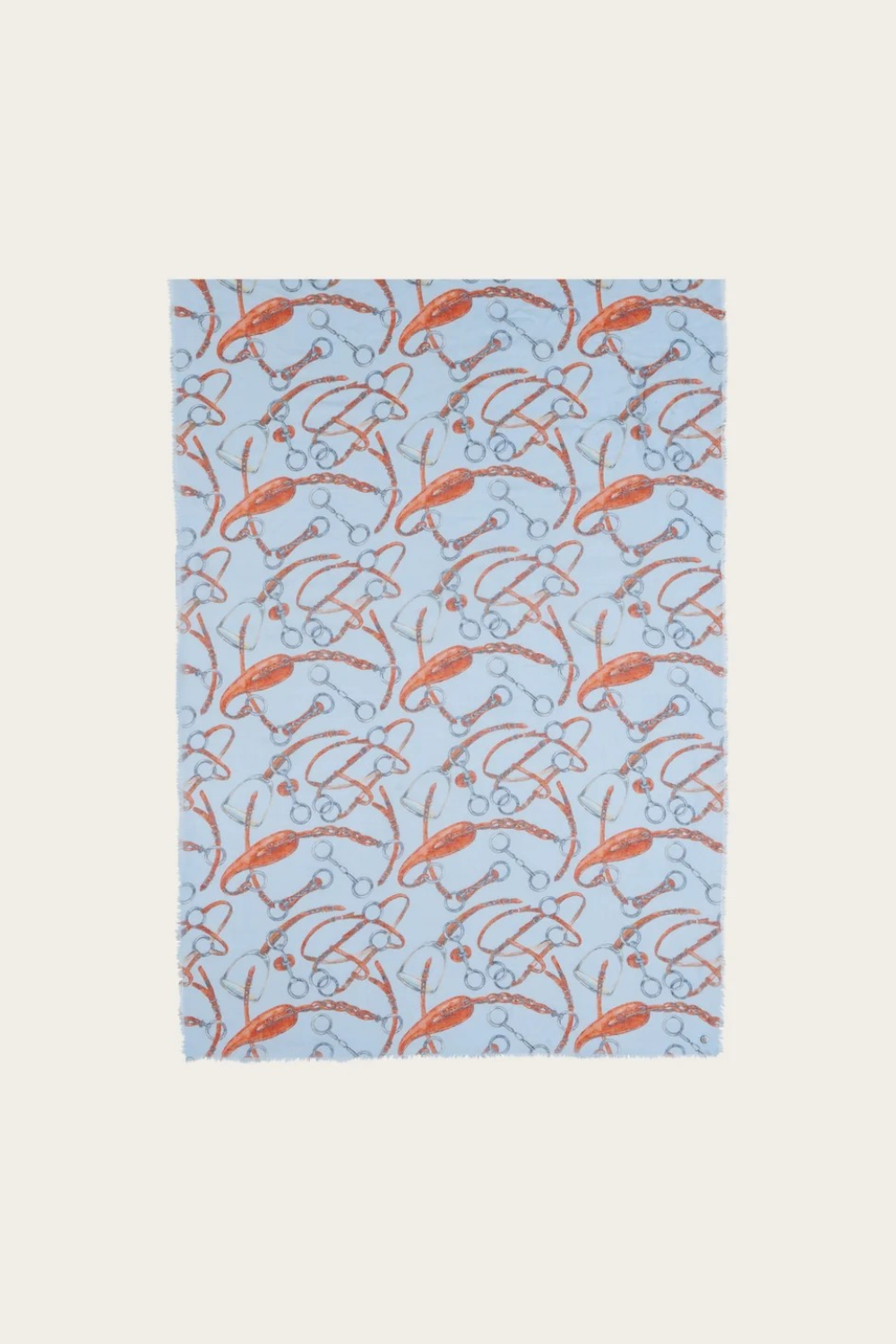 A blue coloured scarf with a brown and grey equestrian print photographed on a light background.