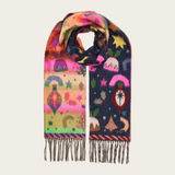 A multicolor patterned scarf with fringe, featuring whimsical celestial and landscape motifs in pink, orange, yellow, green, and navy blue on a light gray background.