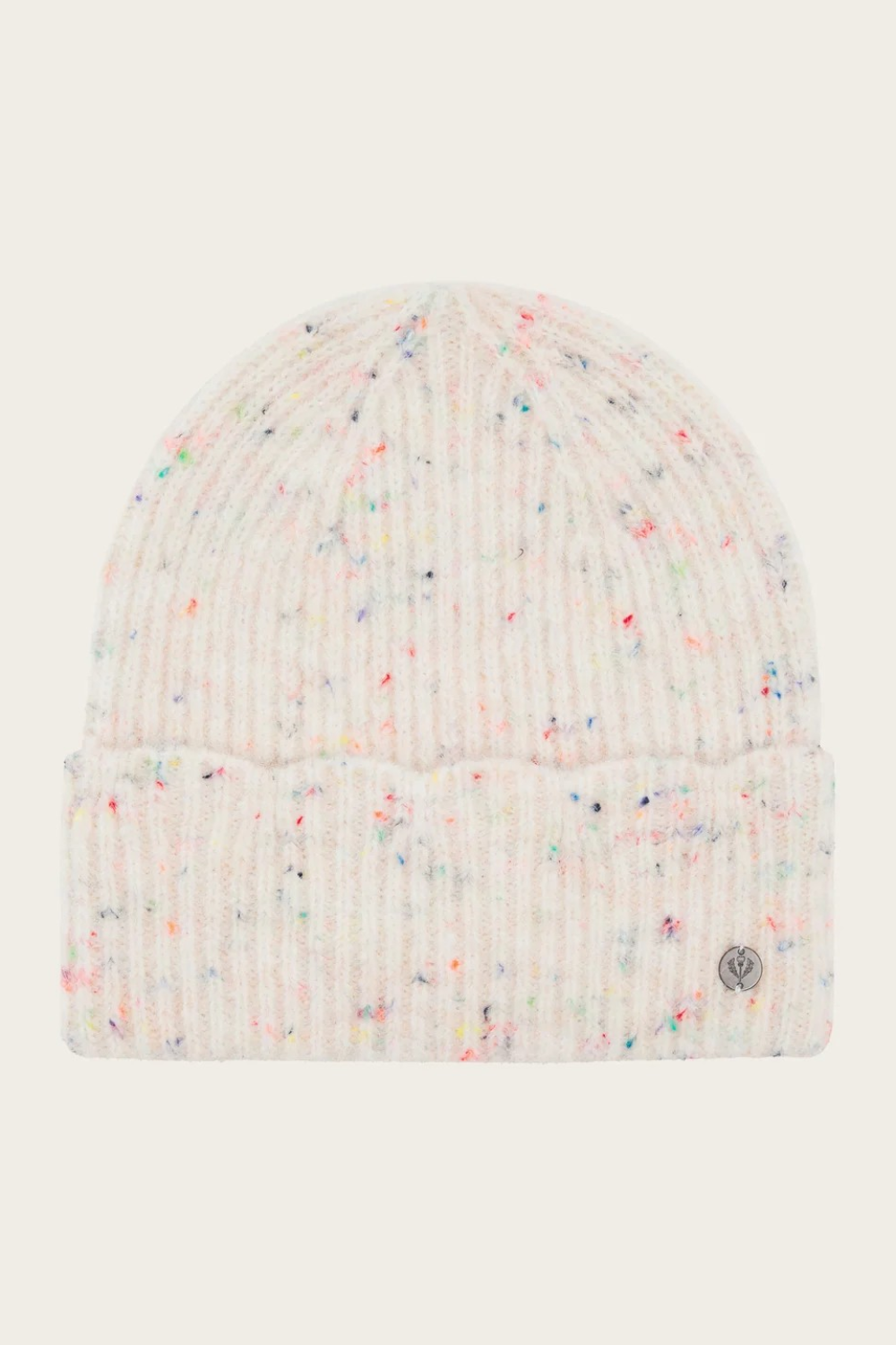 Cream toque with multi coloured flecks photographed on a light background.