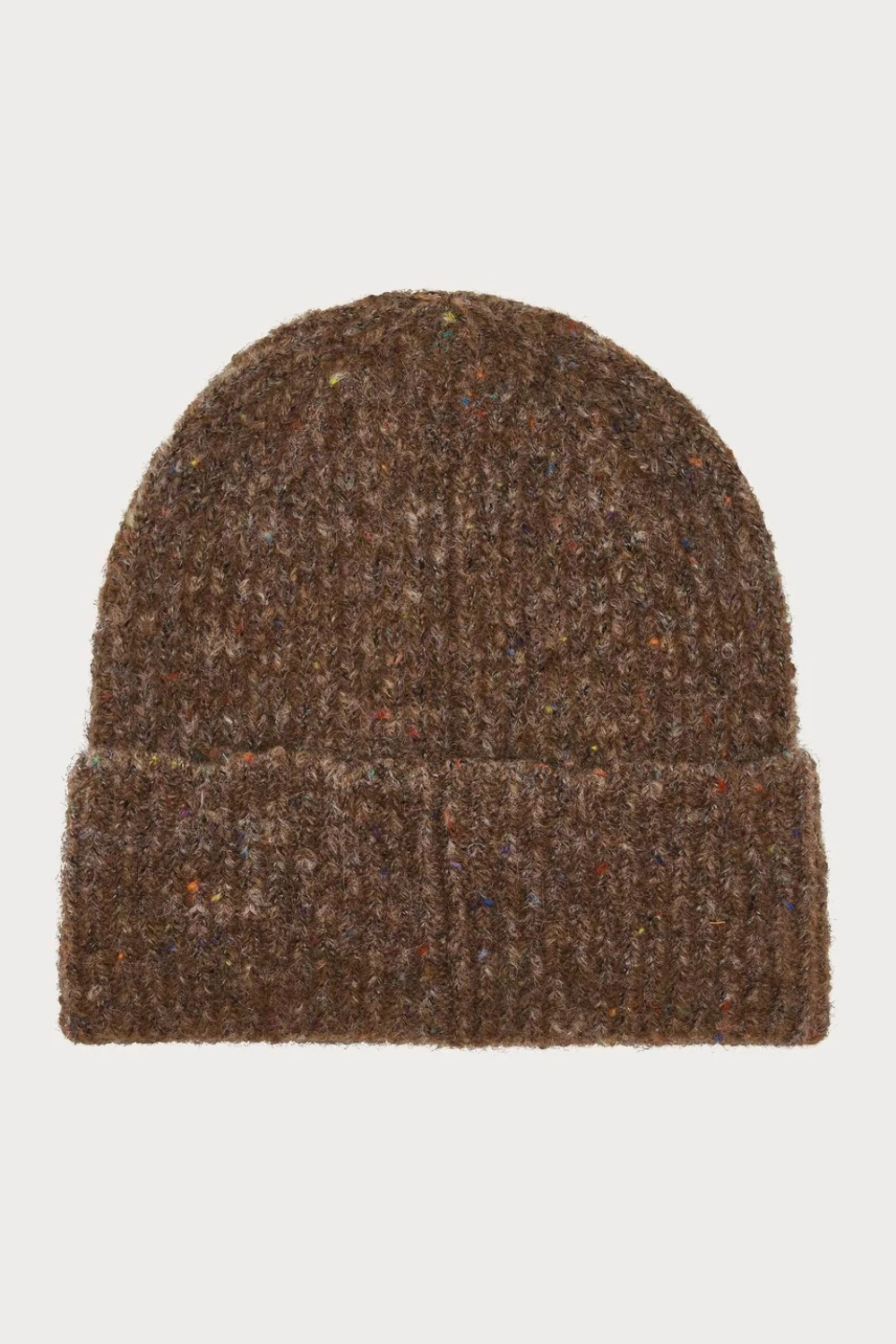Brown toque with multi coloured speckles photographed on a light background.