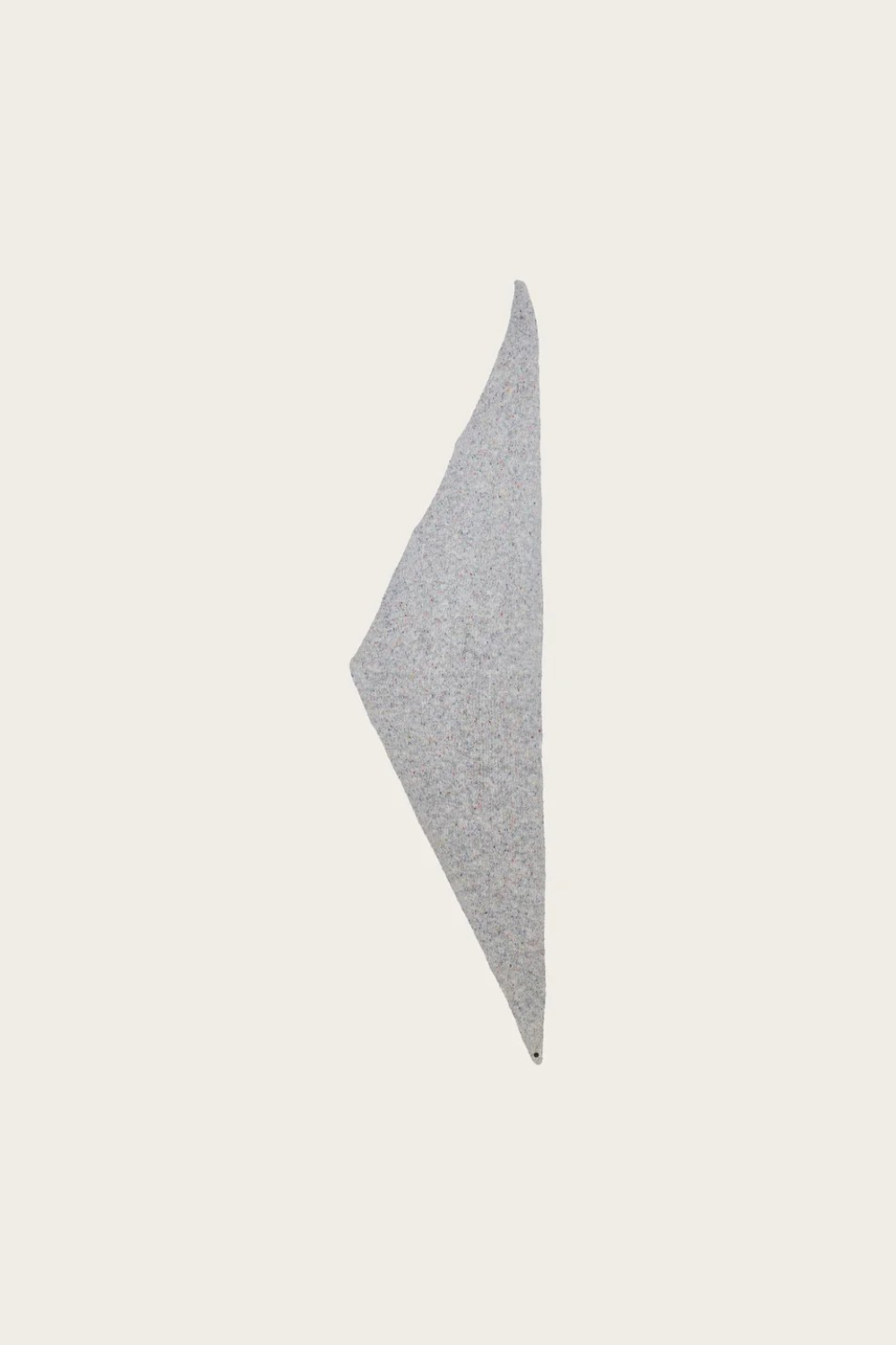 Grey scarf with multi coloured speckles photographed in a triangle shape on a light background.