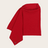 Red poncho photographed against a light background.