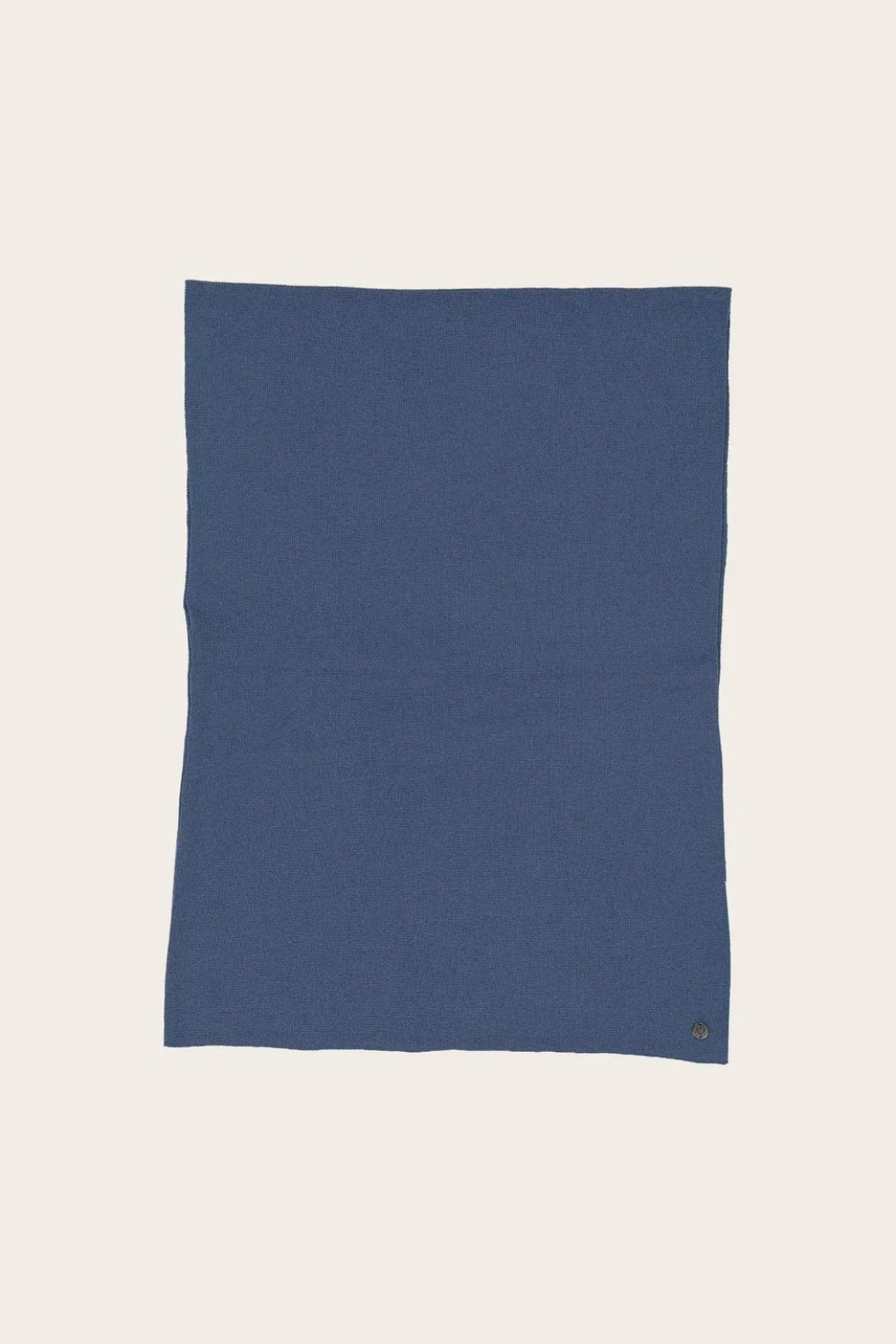 Blue fabric photographed against a light background.
