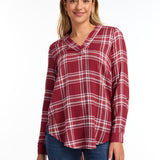 The FDJ Check Textured Tunic boasts a comfortable popover design with a stylish v-neck. The roll tab on the sleeve adds a touch of versatility, while the plaid pattern adds a classic look. Perfect for any casual occasion, this tunic is both functional and fashionable.