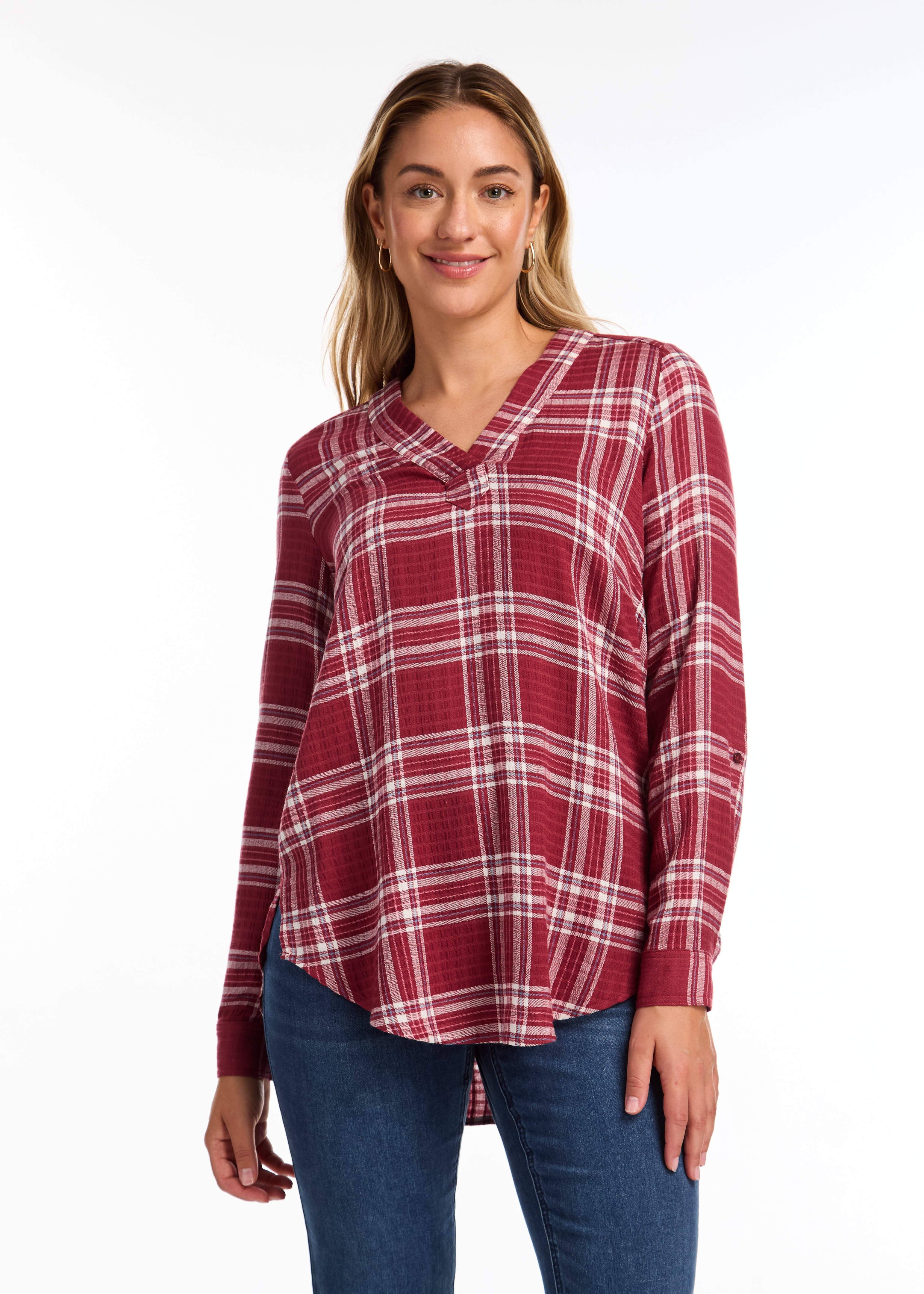 The FDJ Check Textured Tunic boasts a comfortable popover design with a stylish v-neck. The roll tab on the sleeve adds a touch of versatility, while the plaid pattern adds a classic look. Perfect for any casual occasion, this tunic is both functional and fashionable.