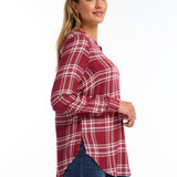 The FDJ Check Textured Tunic boasts a comfortable popover design with a stylish v-neck. The roll tab on the sleeve adds a touch of versatility, while the plaid pattern adds a classic look. Perfect for any casual occasion, this tunic is both functional and fashionable.