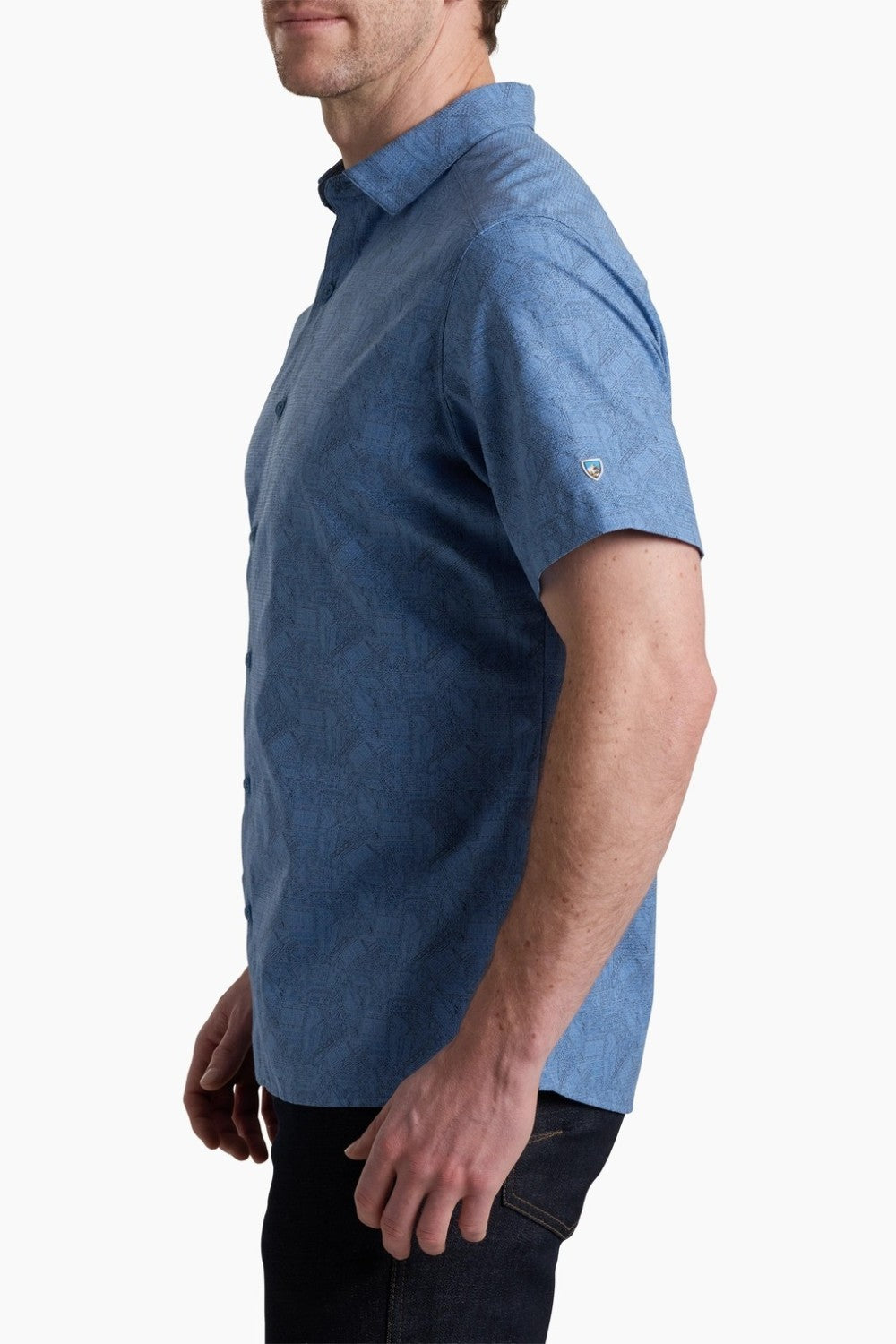 Man wearing a blue short-sleeve shirt on a white background