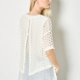 Elevate your wardrobe with this layered tunic top. With knitted mesh and woven layers designed to create a soft, relaxed fit, it boasts a button-down back, a curved hem, and a shimmering finish. Style with slim-fit trousers when the weekend arrives, or create a feminine, free-flowing silhouette with a tiered maxi skirt for a boho chic look.