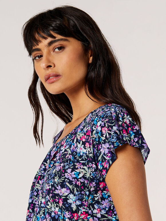 Boasting a sunshine-ready floral print, this top is perfect for all your weekend plans. Lightweight and woven, it features pintuck pleating at the neckline, a keyhole fastening at the nape and pretty tulip sleeves. Keep it casual and team with slim-fit jeans.