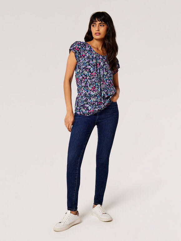 Boasting a sunshine-ready floral print, this top is perfect for all your weekend plans. Lightweight and woven, it features pintuck pleating at the neckline, a keyhole fastening at the nape and pretty tulip sleeves. Keep it casual and team with slim-fit jeans.