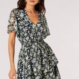 With a pretty watercolour rose print, this mini dress is the perfect option for all your weekend plans. Crafted from lightweight chiffon and lined for comfort, this sunshine-ready dress boasts a flattering V-neckline, a smocked waist for a defined fit, angel sleeves and a skirt that falls in fluid tiers. Style it with strappy sandals to complete the look.