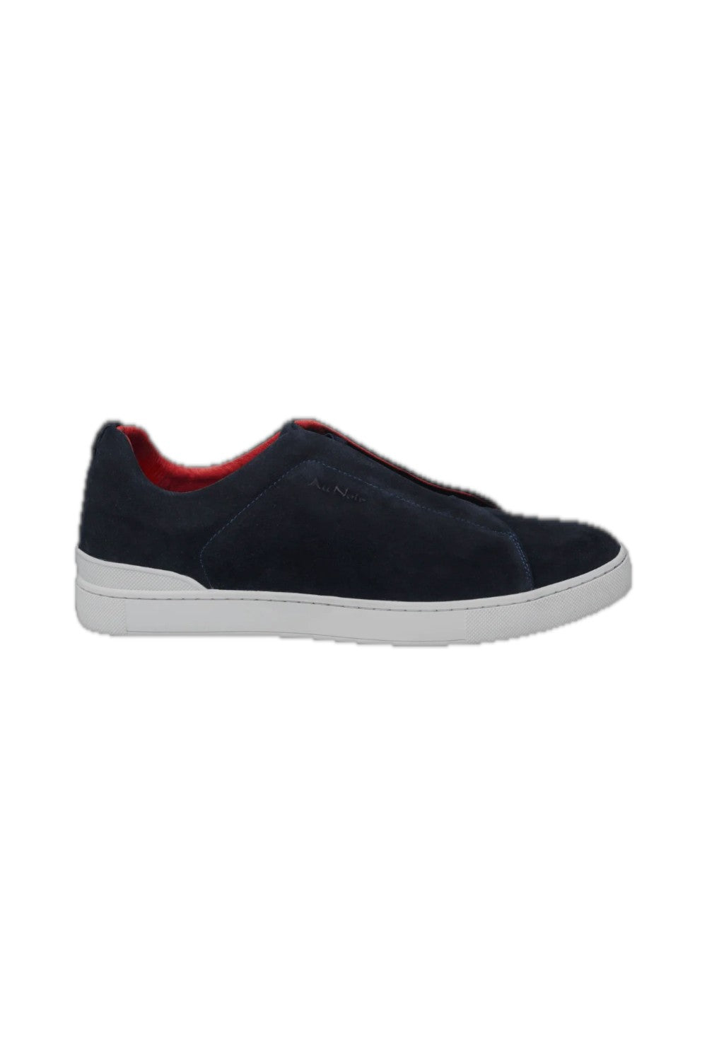 Discover our elegant navy blue suede sneaker, designed to combine comfort and versatility. The shoe features a vibrant red trim that adds a splash of color, making it a perfect choice for casual outings or sporting activities. Made from high-quality materials, this sneaker ensures durability while offering a comfortable fit for all-day wear. Enhance your shoe collection with this modern, chic design.