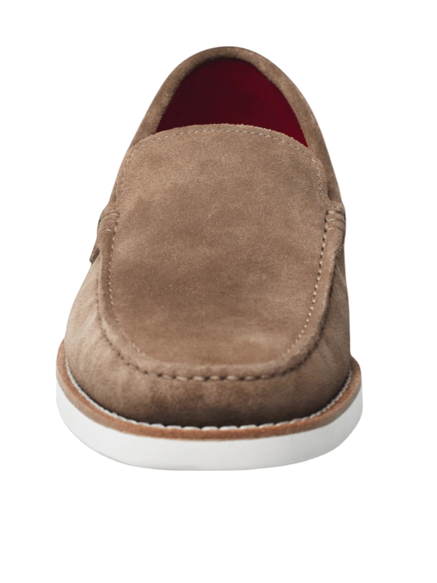 This elegant and refined tan loafer features a bold red sole, adding a modern touch to a classic design. Crafted from high-quality materials, it offers optimum comfort while being perfect for both formal and casual occasions. Its timeless style makes it a must-have for any sophisticated wardrobe.