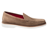 This elegant and refined tan loafer features a bold red sole, adding a modern touch to a classic design. Crafted from high-quality materials, it offers optimum comfort while being perfect for both formal and casual occasions. Its timeless style makes it a must-have for any sophisticated wardrobe.