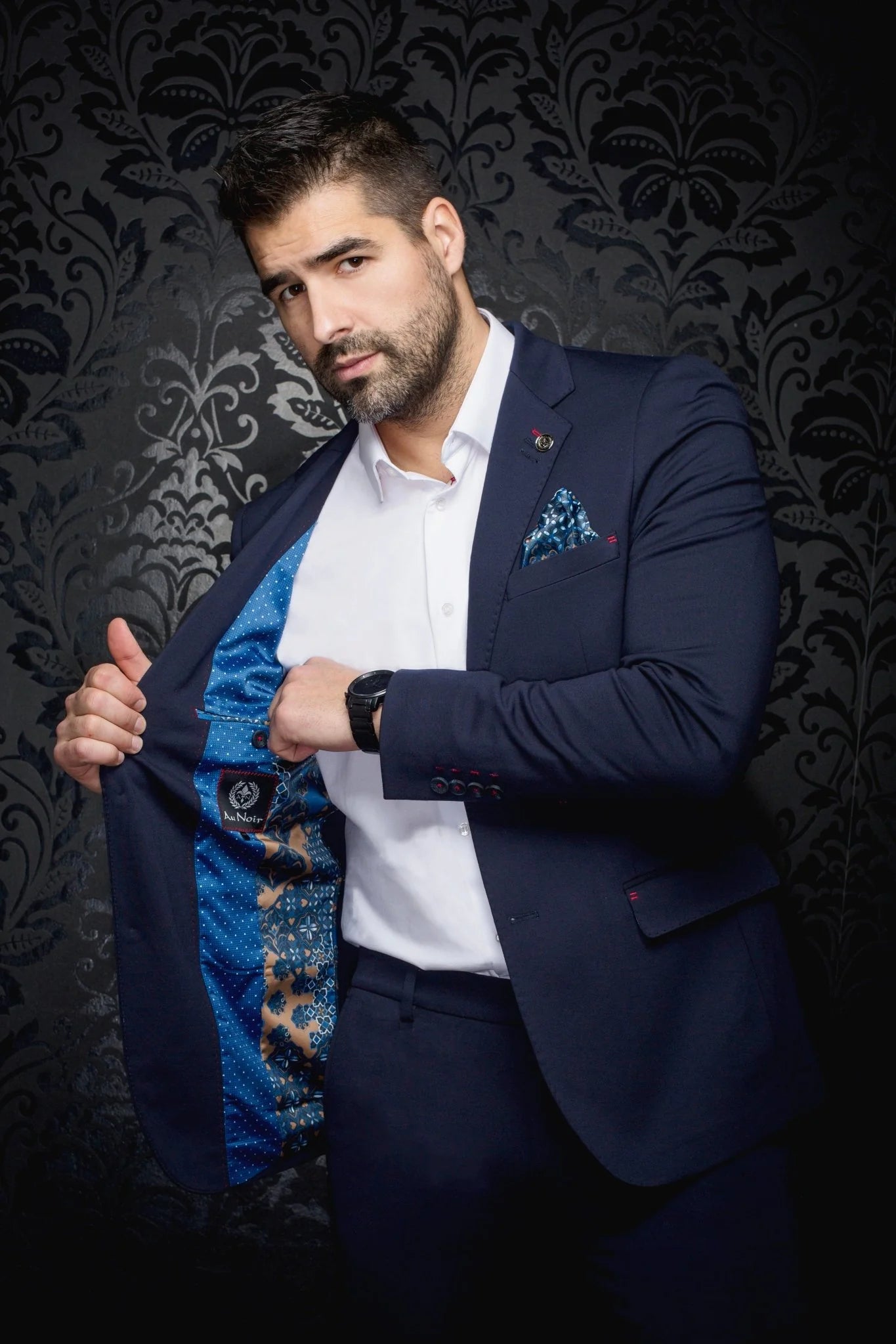 Blazer Fashionable and stretchy for men. Stand out with our sophisticated details and patterned lining. Comfortable with a premium fabric blend offering confidence and freedom of movement.