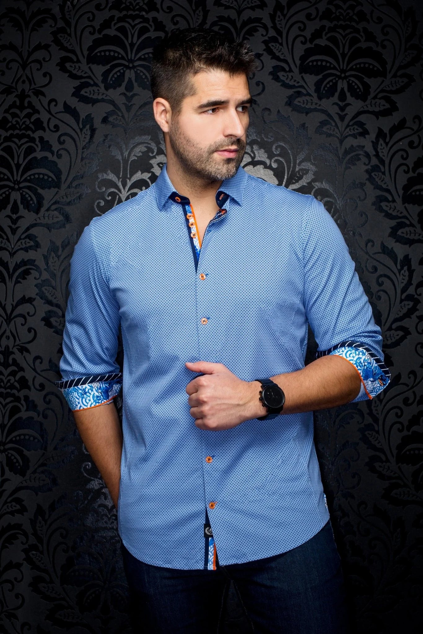 Introduce a touch of elegance and sophistication to your wardrobe with the Au Noir Miron Dress Shirt. Featuring a modern-fit design, this shirt can be effortlessly worn tucked in or out of pants. With unique features such as angled buttonhole and multiple embroidery detailing of the AU NOIR signature, this Canadian owned and designed brand exudes luxury and style.