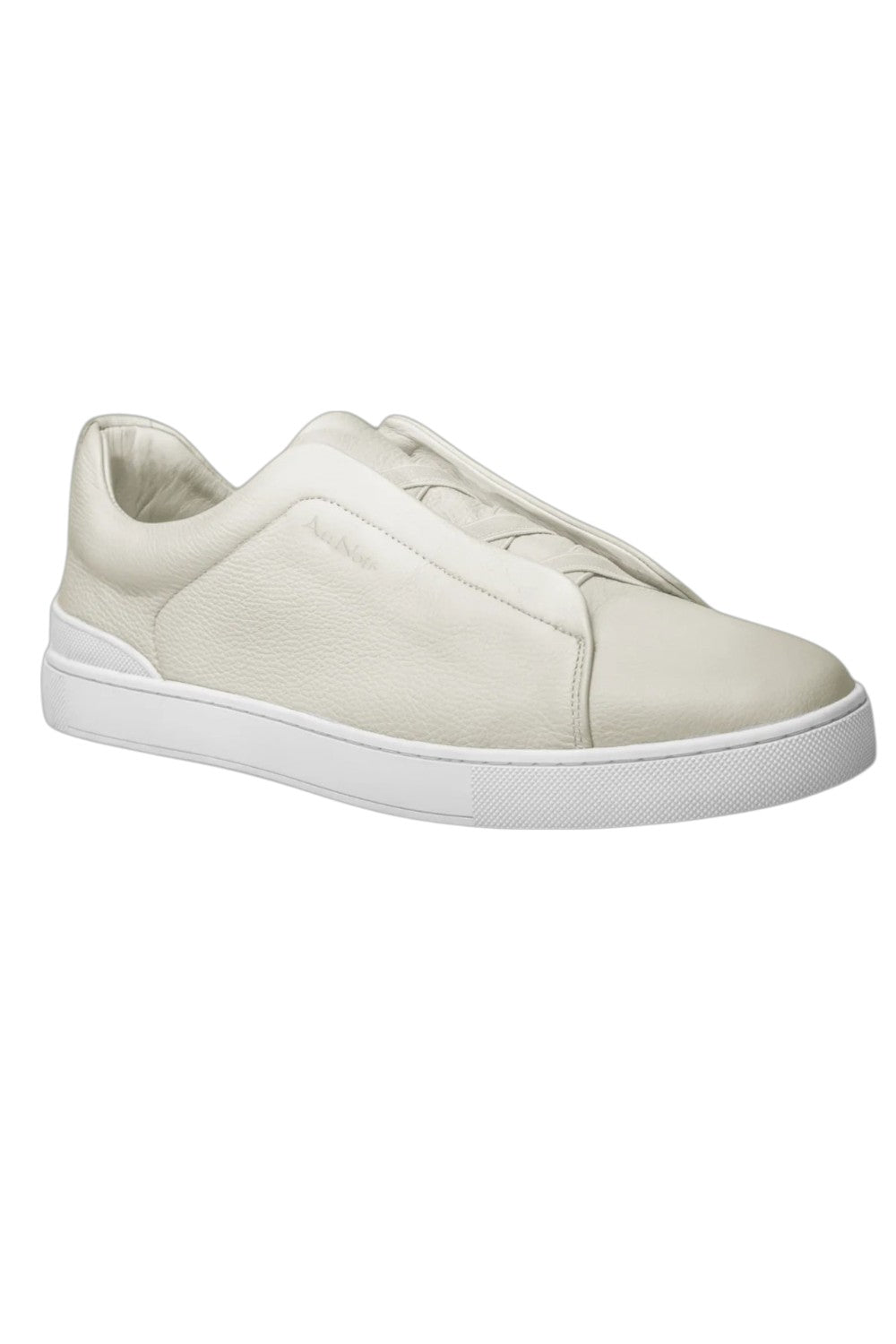 Enhance your casual footwear collection with these white leather slip-on sneakers, designed for comfort and style. Crafted from high-quality leather, these sneakers offer a sleek, modern aesthetic, making them versatile for a variety of outfits. The slip-on design ensures easy wear, while the cushioned insole offers all-day comfort. Perfect for a casual day or a quick run, these sneakers are an essential addition to your wardrobe.
